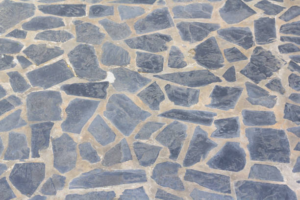 istock stone floor background and texture, outdoor rock pavement 927669648