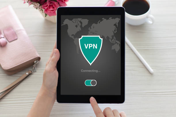 istock woman holding tablet app vpn creation Internet protocols protection network 927672748