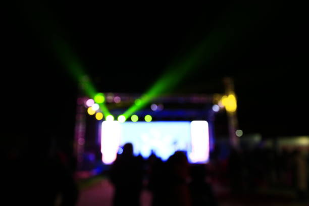 istock Stage lighting effect in the dark, fuzzy figure 927687156