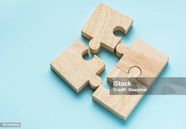 Jigsaw Teamwork Concept Macro Shot Stock Photo - Download Image Now - Puzzle, Partnership - Teamwork, Business Relationship