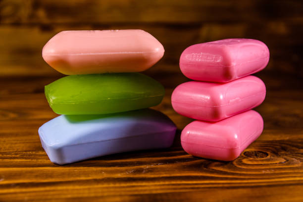 istock Pieces of the soap on wooden table 927702582