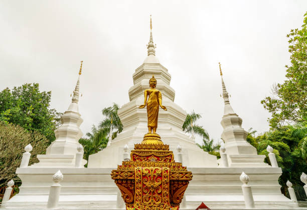 Xishuangbanna Baita Temple White pagoda in Buddhist temple in Xishuangbanna, Sipsongpanna, or Sibsongbanna in the south of Yunnan province, People's Republic of China. xishuangbanna stock pictures, royalty-free photos & images