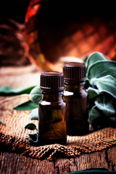 istock Essential sage oil in brown bottle 927705218