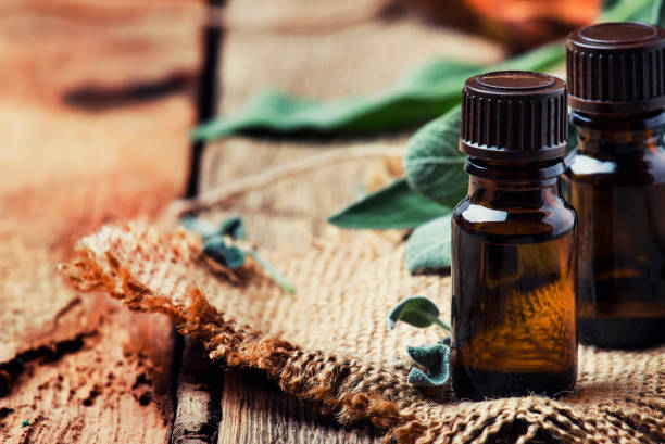 istock Essential sage oil in brown bottle 927708158