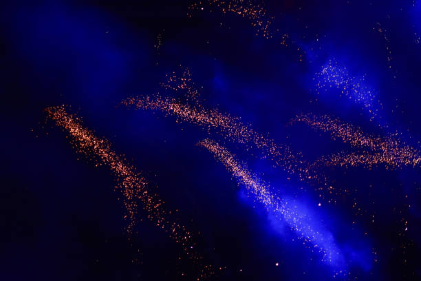 istock Light lines and smoke on blue ground For background and design 927708160