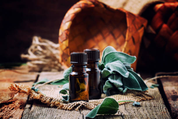 istock Essential sage oil in brown bottle 927708680