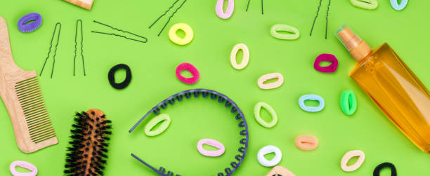 istock set for styling hair on a green background 927709102