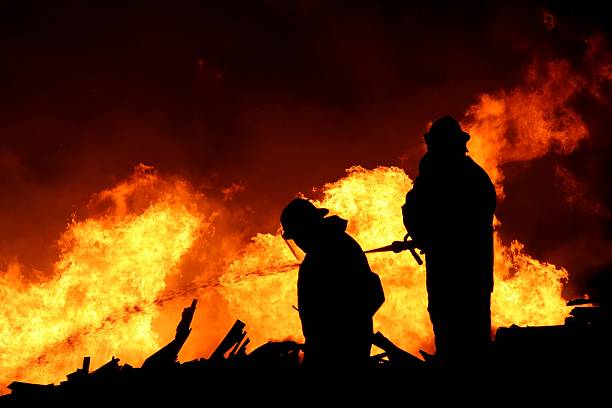 Firemen Silhouette stock photo