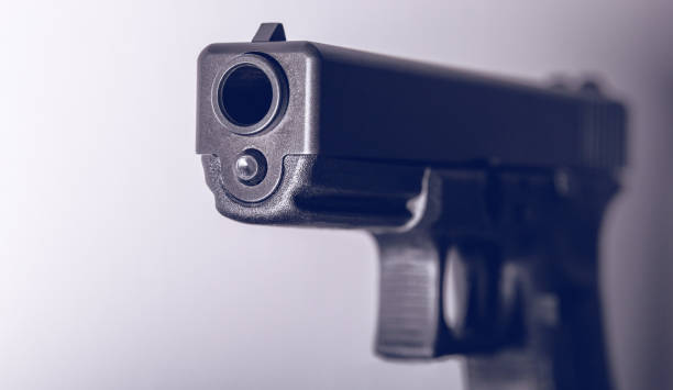 istock Looking Down the Barrel of a Handgun 927724006