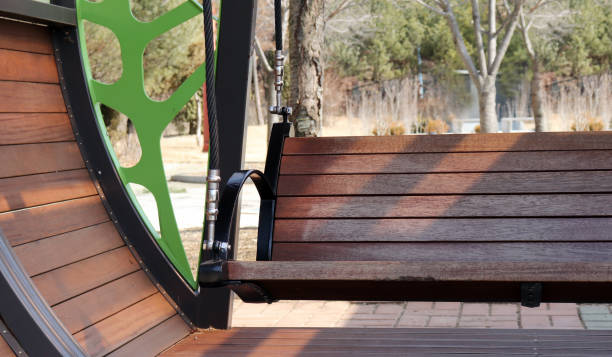 istock A wooden swing chair at park. 927724598