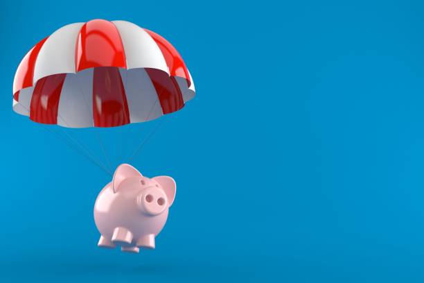 istock Piggy bank with parachute 927730520