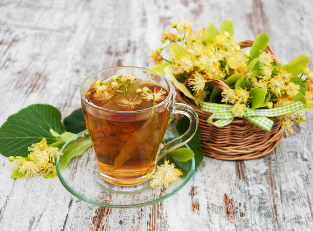 istock cup of herbal tea with linden flowers 927744770