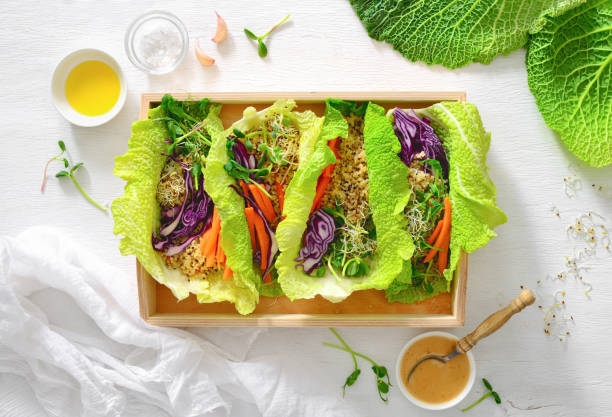 istock Vegan detox spring rolls with quinoa, sprouts and Thai peanut sauce 927760448