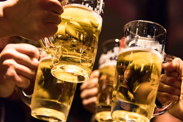 istock Celebratory toast with beer 927760584