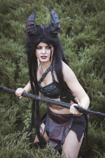 istock Beautiful brunette in a savage costume. 927761066