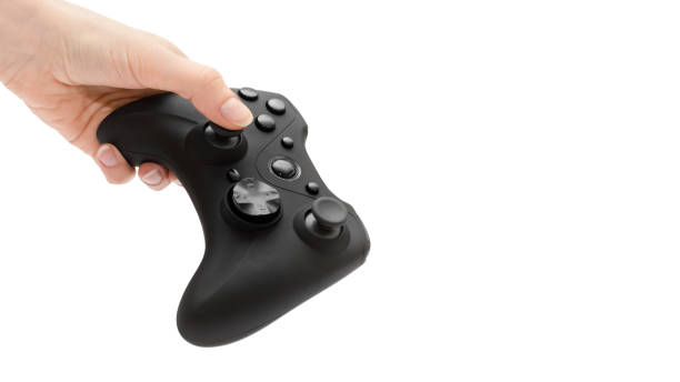 istock woman hand holding gamepad. Isolated on white background. copy space, template. 927765170