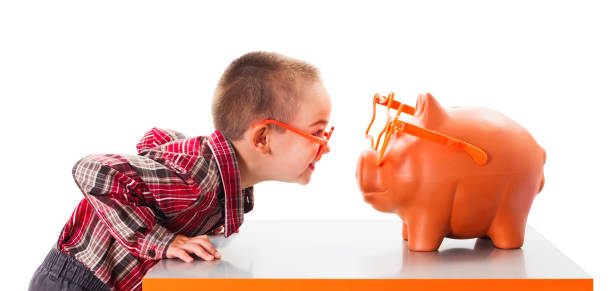 Playing with Piggy Bank stock photo