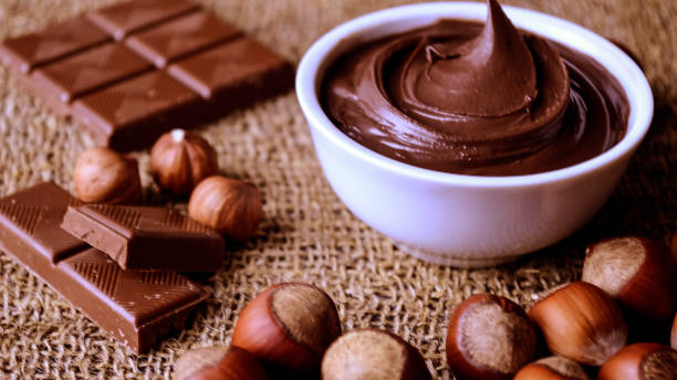istock Hazelnuts and nuts lying the table. Healthy snack food. Dessert 927771490