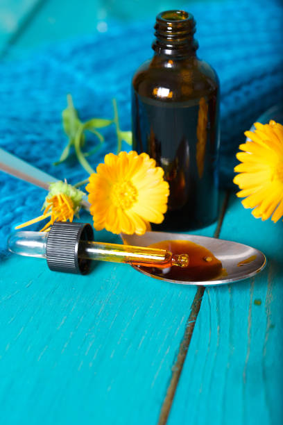 istock Calendula tincture for mouth rinsing. 927775106