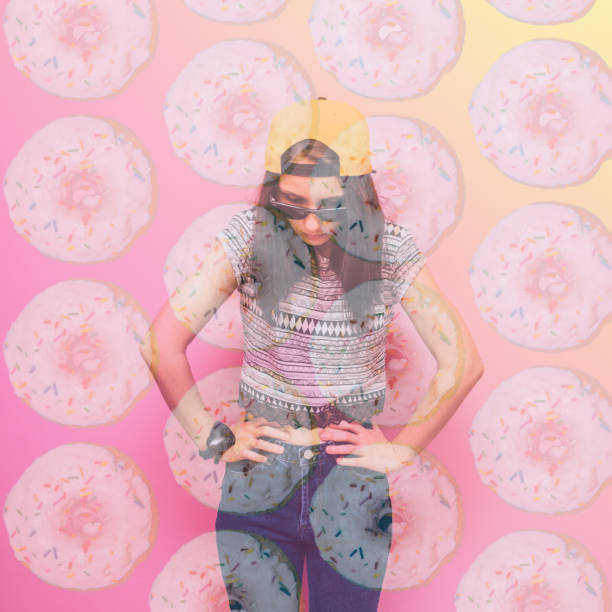 istock girl with hands on a belt and doughnuts 927775452