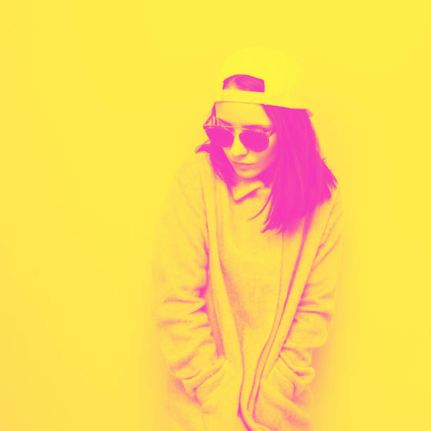 istock girl in cap and coat 927775780