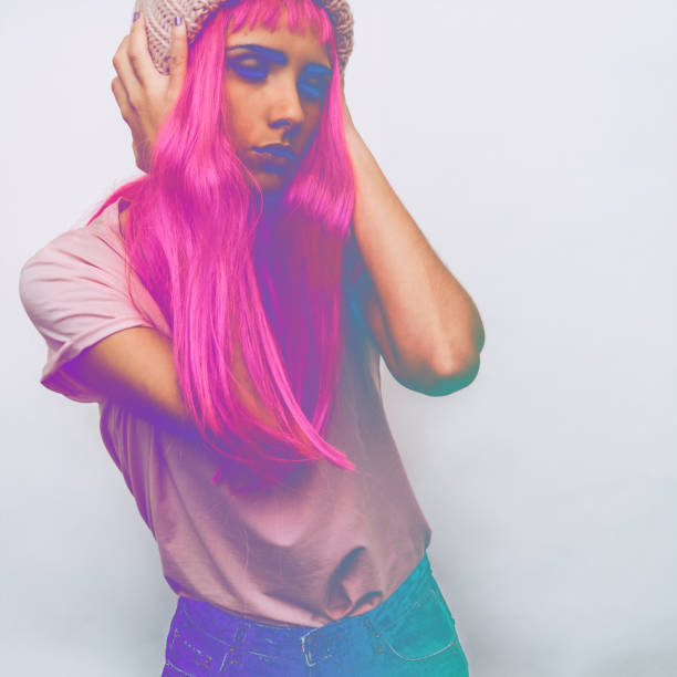 istock the girl in a pink wig 927775820