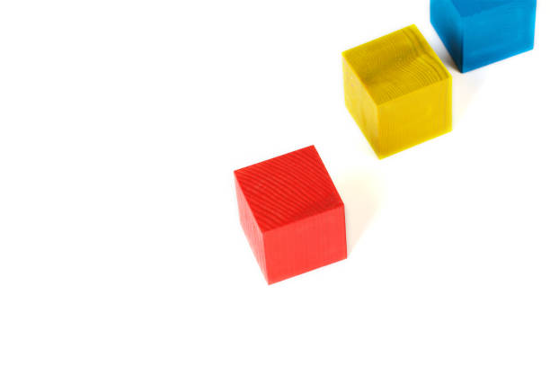 istock Colourful wooden made cubes on a gray surface. 927784872