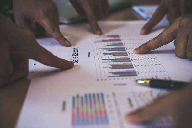 istock Group of business partners discussing ideas analysis and planning work in office. 927784996