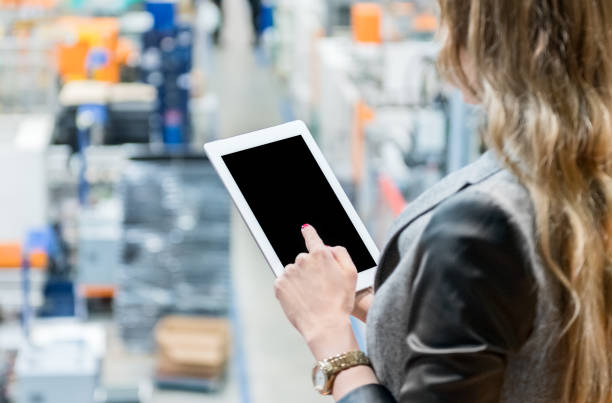 istock Woman using digital tablet & business strategy 927785226