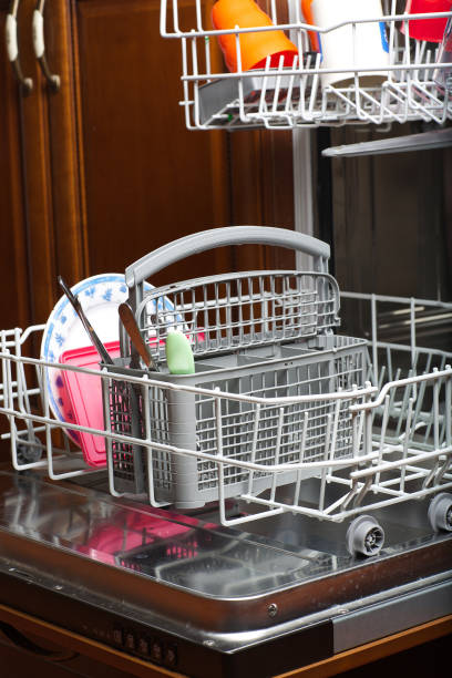 istock Dirty plates in a dishwashing machine. 927793808