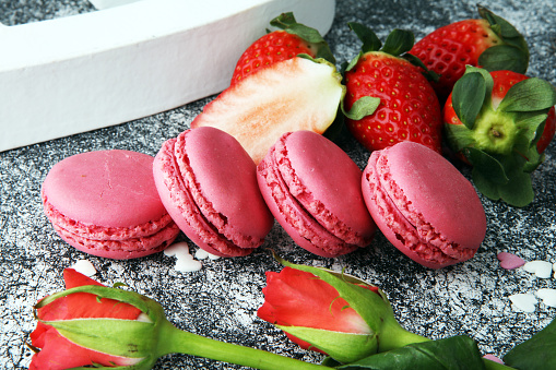 Sweet and colourful french macaroons or macaron with strawberry
