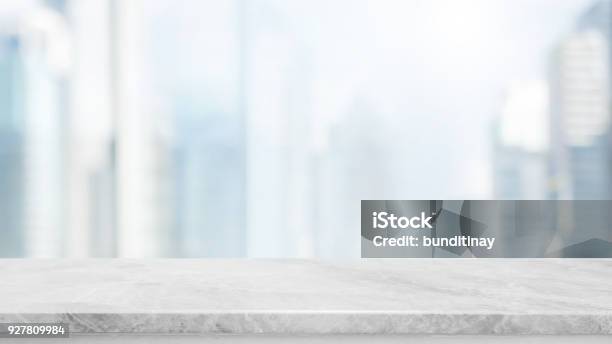 Empty White Marble Stone Table Top And Blur Glass Window Wall Building With City View Background Can Used For Display Or Montage Your Products Stock Photo - Download Image Now