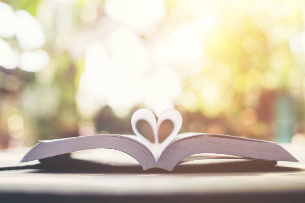 istock Heart book page , love concept 927810066