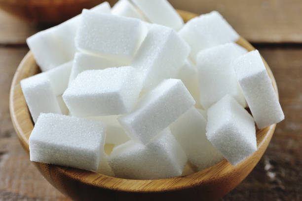 istock Sugar cubes in a wooden bowl 927822922
