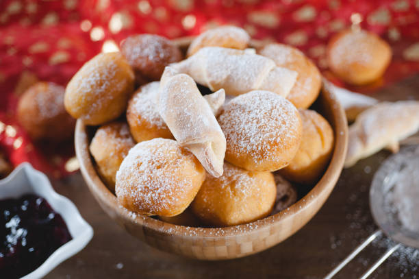 istock Sweet fried donuts dessert pastry balls filled with jam 927825948
