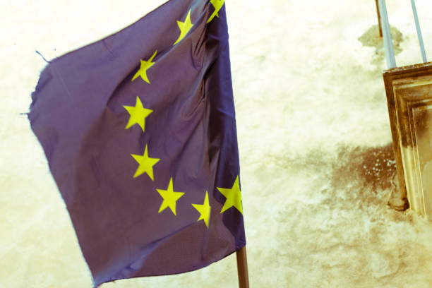 istock Tattered Old EU Flag Flying; White Background 927826002