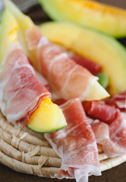 istock Italian appetizer - fresh melon and delicious parma ham 927826112