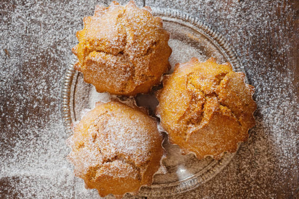 istock Delicious baked sweet muffin cake with icing sugar 927826862
