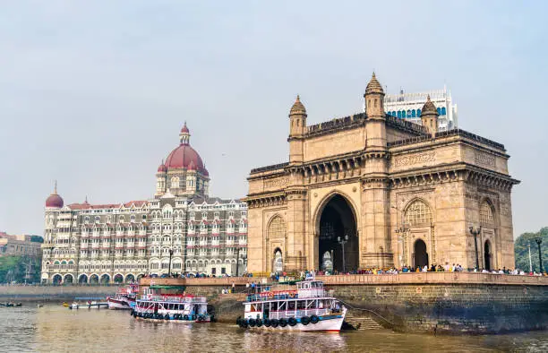 Photo of The Gateway of India and Taj Mahal Palace as seen from the Arabian Sea. Mumbai - India