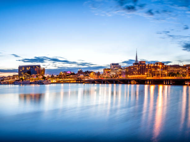 istock Stockholm sunset skyline panorama with City Hall 927840438