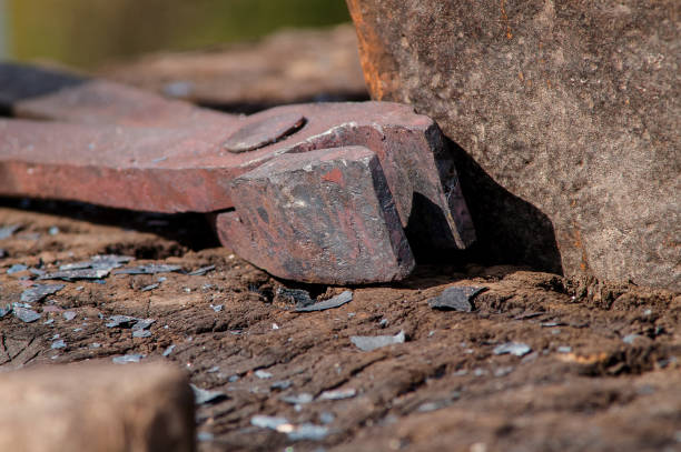 istock medieval iron tongs and anvil blacksmith closeup 927843012