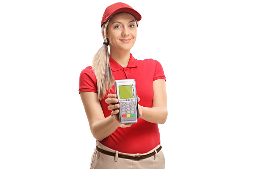 Delivery woman with a payment terminal isolated on white background