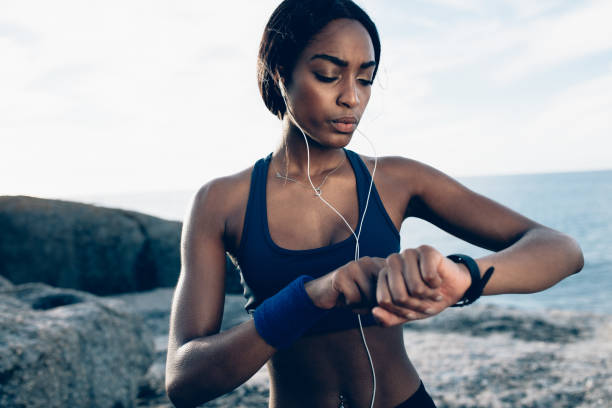istock Female runner monitor her performance on smartwatch 927853072