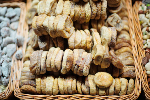 istock Dried figs in a wooden basket 927853636