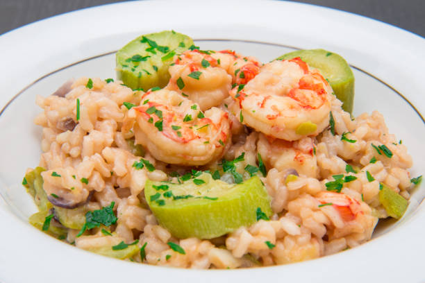 istock dish with risotto with prawns and zucchini 927856360