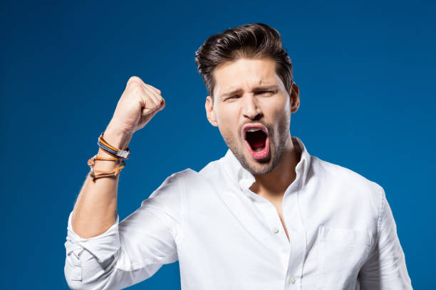 istock Summer portrait of successful man, blue background 927857530
