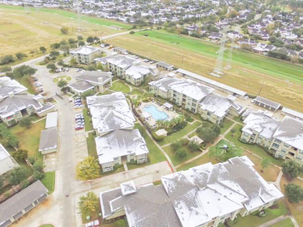 istock Aerial view snow covered apartment complex building in Texas, America 927864206