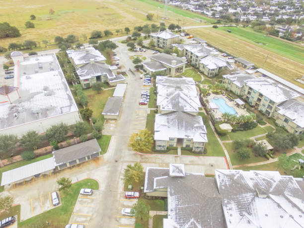 istock Aerial view snow covered apartment complex building in Texas, America 927867044