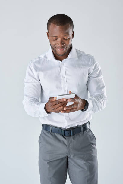 istock African executive professional businessman with touchscreen tablet 927868458