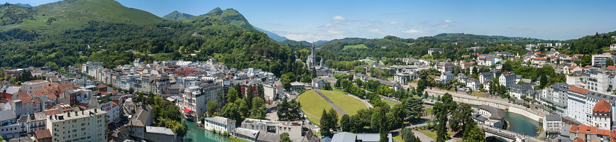 Panoramic view of the city Lourdes - the Sanctuary of Our Lady of Lourdes, the Hautes-Pyrenees department in the Occitanie region in south-western France